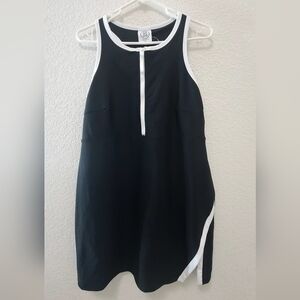 Black and White Sleeveless Athletic Dress With Built In Shorts With Pocket.
